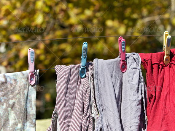 Pegs and washing on line in a garden