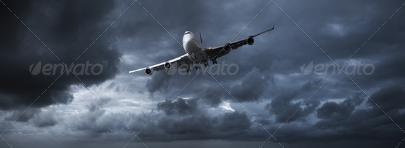 Jet aircraft in a stormy sky