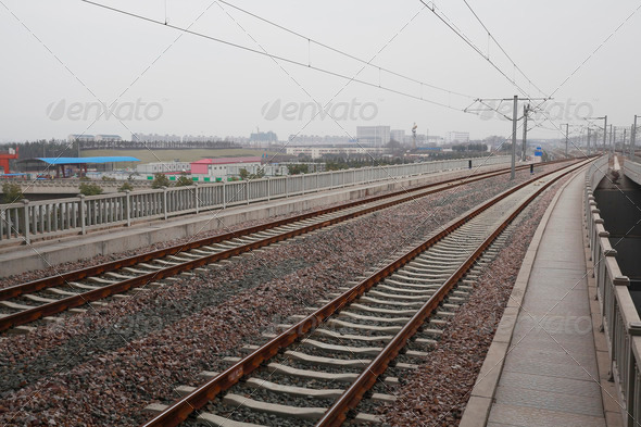 High-speed rail at railroad metal track with track bed