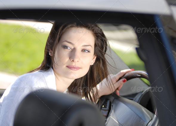 portrait of woman in the car