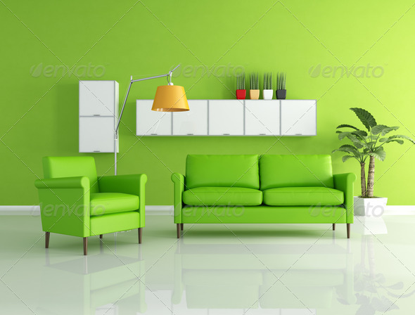 green sofa and armchair in a modern living room