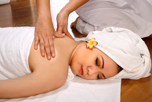 Asian Woman Get Massage On The Spa