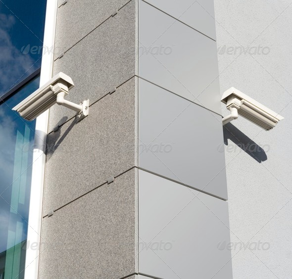 Security cams attached on corner of the building